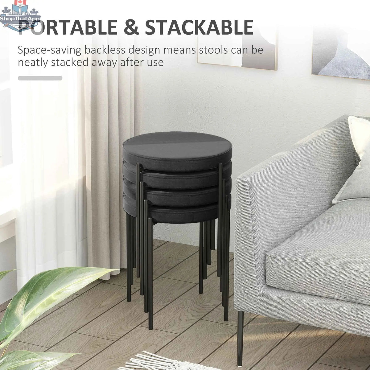 Set of four black Noel backless round dining stools with metal legs by SLOTH Nation, ideal for modern kitchen and dining spaces.