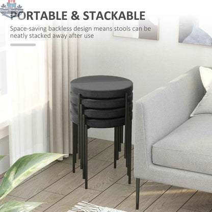 Set of four black Noel backless round dining stools with metal legs by SLOTH Nation, ideal for modern kitchen and dining spaces.