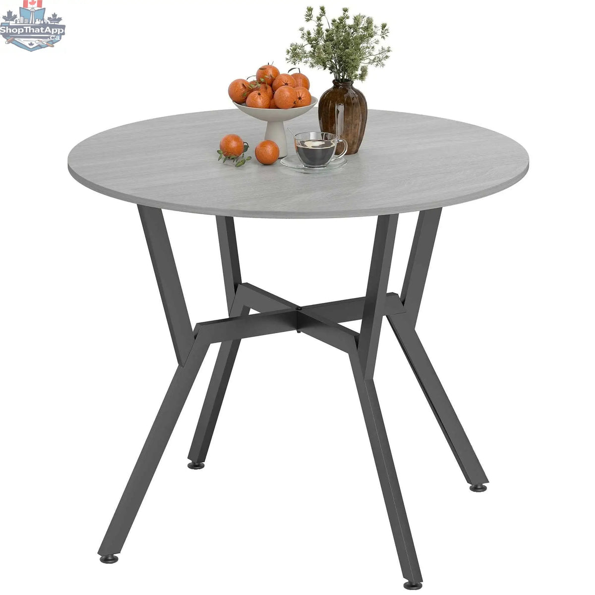 A grey Ainsley round dining table with a steel frame, 35-inch diameter, featuring a modern home furnishings design.