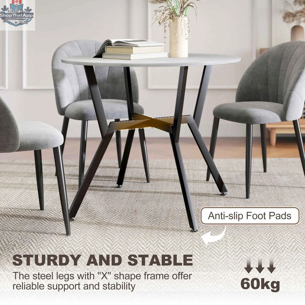 Grey Ainsley round dining table with a steel frame, 35-inch diameter, from SLOTH Nation, ideal for kitchen and dining spaces.