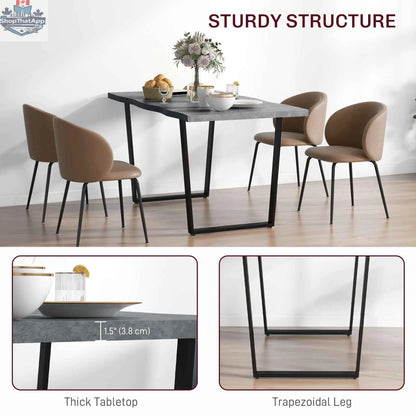 Ashton 63-inch dining table with wave-edged cement grey tabletop and steel legs, modern kitchen and dining furniture by SLOTH Nation.