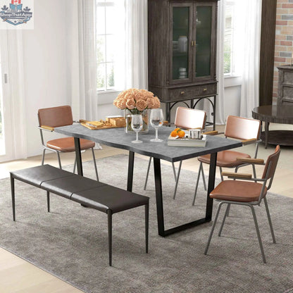 Ashton 63-inch dining table with wave-edged cement grey tabletop and steel legs, ideal for modern kitchen and dining spaces.