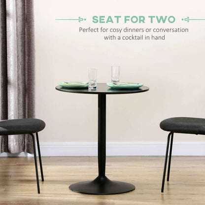 Black Jan modern round dining table with steel base, perfect for small spaces, by SLOTH Nation in home dining furniture.