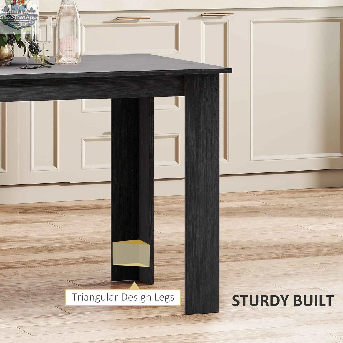 Black 47-inch dining table by SLOTH Nation, seats 4-6 people, modern home furnishings for kitchen and dining room.