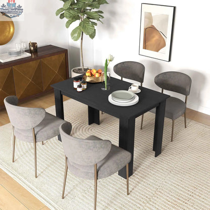 Black 47-inch dining table by SLOTH Nation, designed for 4-6 people, ideal for kitchen or dining room settings.