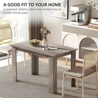 Light grey Spencer 47-inch dining table by SLOTH Nation, designed for 4-6 people, showcasing a modern kitchen and dining furniture style.