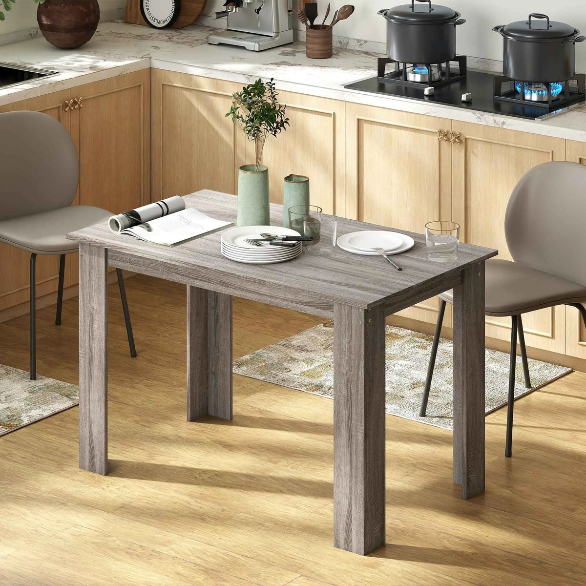 Light grey Spencer 47-inch dining table by SLOTH Nation, perfect for 4-6 people, in a modern kitchen setting.