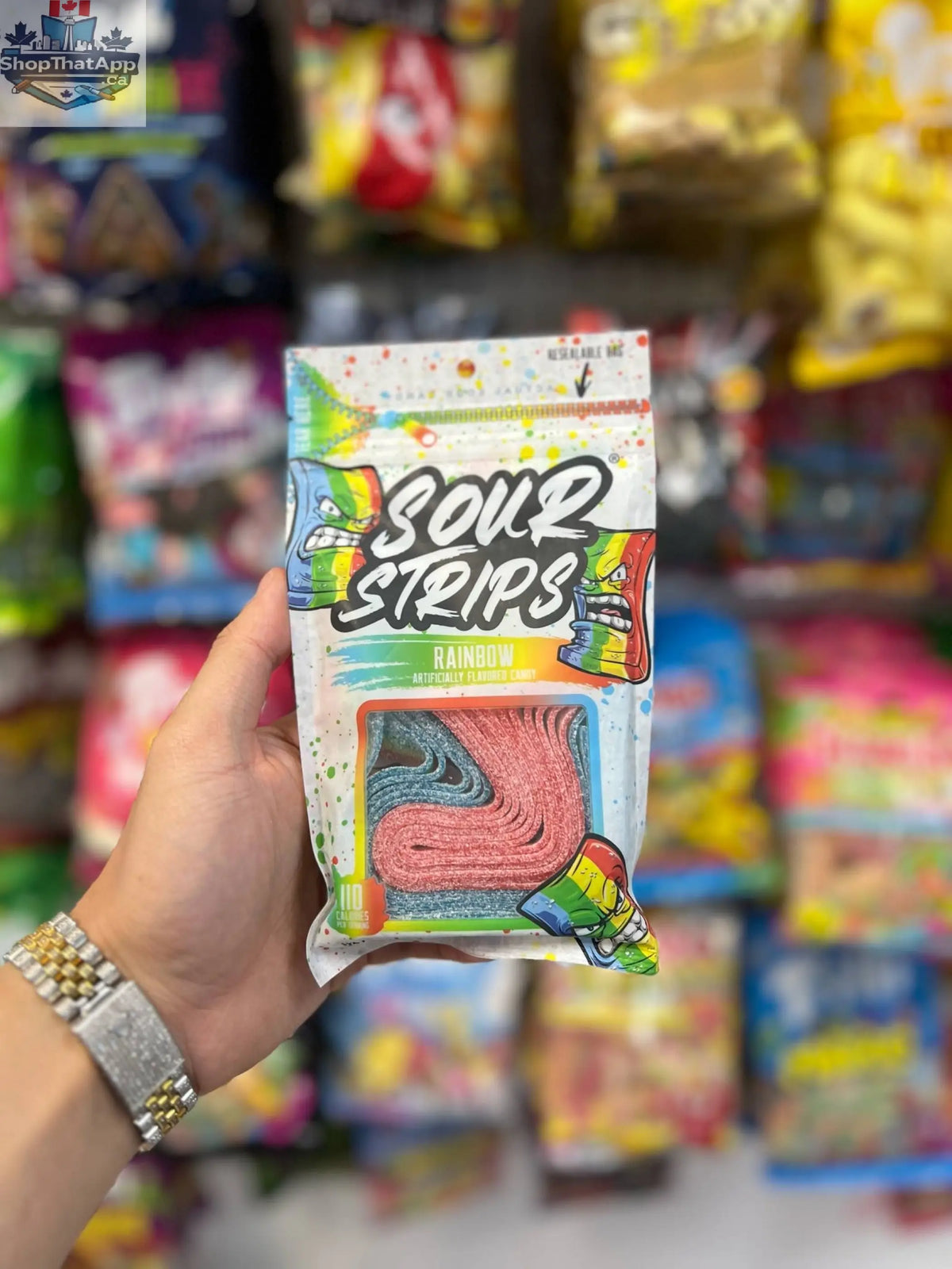 Colorful Sour Strips Rainbow Candy from Snack Bar Co, showing vibrant, chewy, fruity candies in a 96g package.