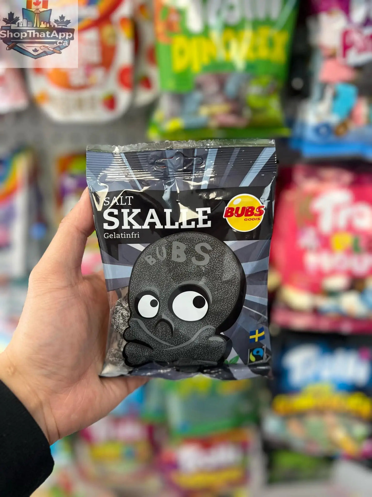Gelatin-free salty licorice skull candies from Bubs Godis by Snack Bar Co, with black and white skull shapes on a white background.
