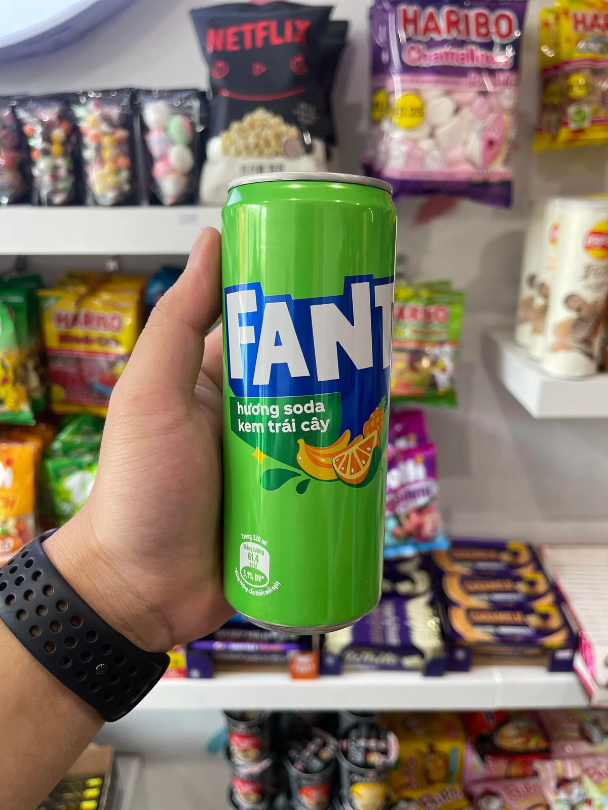 Fanta Cream Soda Vietnam in a 320ml glass bottle, featuring colorful fruit flavor branding and sparkling soda inside.