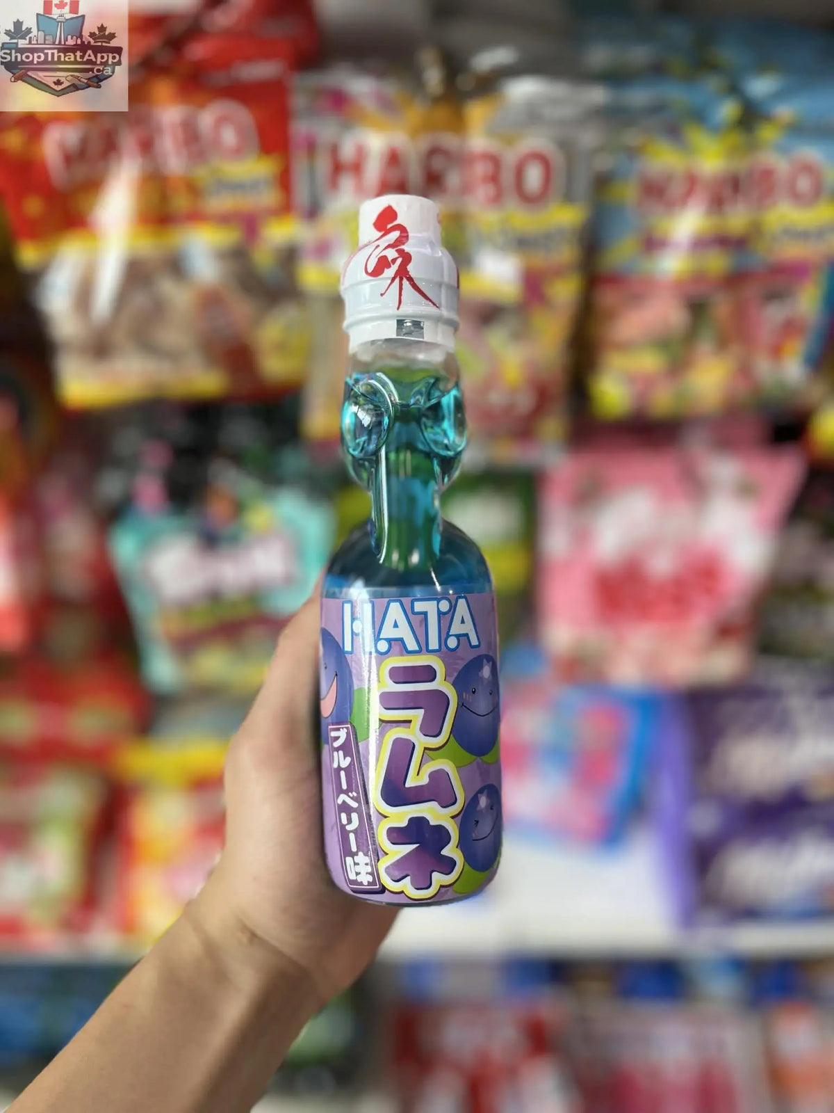 Blueberry HATA Ramune Soda in a 200ml Japanese beverage bottle, featuring colorful packaging and refreshing drink inside.