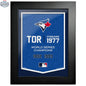 Toronto Blue Jays framed wall decor featuring team logo and dynamic design, 12x16 size, ideal for sports room or fan display.