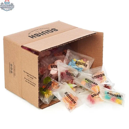 SQUISH Candies Canada Ultimate Sharing Box featuring colorful candies, including NIBI 8'0'' inflatable paddle board for kids and assorted treats.