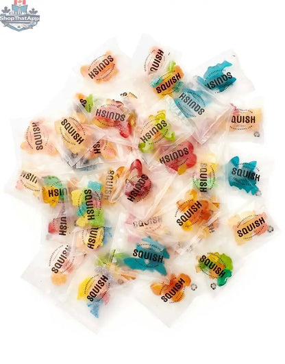 SQUISH Candies Canada Ultimate Sharing Box with colorful candies and toys, designed for kids' enjoyment and sharing.