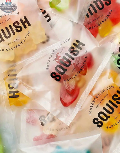Close-up of SQUISH Candies Canada Ultimate Sharing Box with colorful candies inside, designed for kids' fun and sharing.