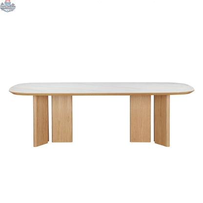 Modern Donton dining table by Hygge Design House with wooden surface and sleek metal legs, perfect for contemporary dining rooms.