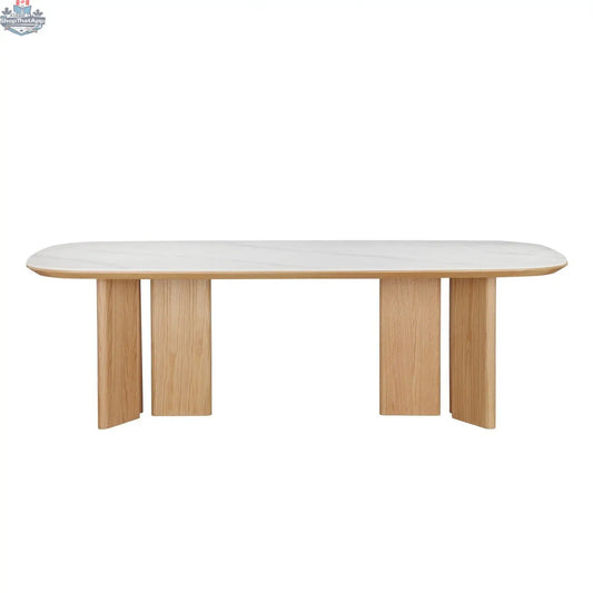Modern Donton dining table by Hygge Design House with wooden surface and sleek metal legs, perfect for contemporary dining rooms.