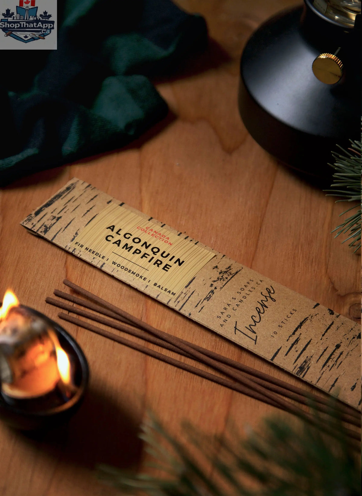 Algonquin Campfire incense sticks from Stopandsmellthecandles, used for relaxation and aromatherapy, with burning incense and smoke.