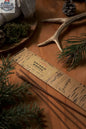 Ontario Woods incense sticks for relaxation and aromatherapy, shown in a natural wooden box with burning incense sticks inside.