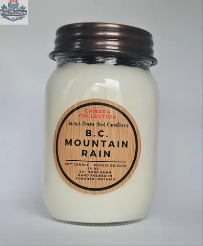 BC Mountain Rain soy candle by Stopandsmellthecandles, 14oz jar with a label, perfect for refreshing aromatherapy.