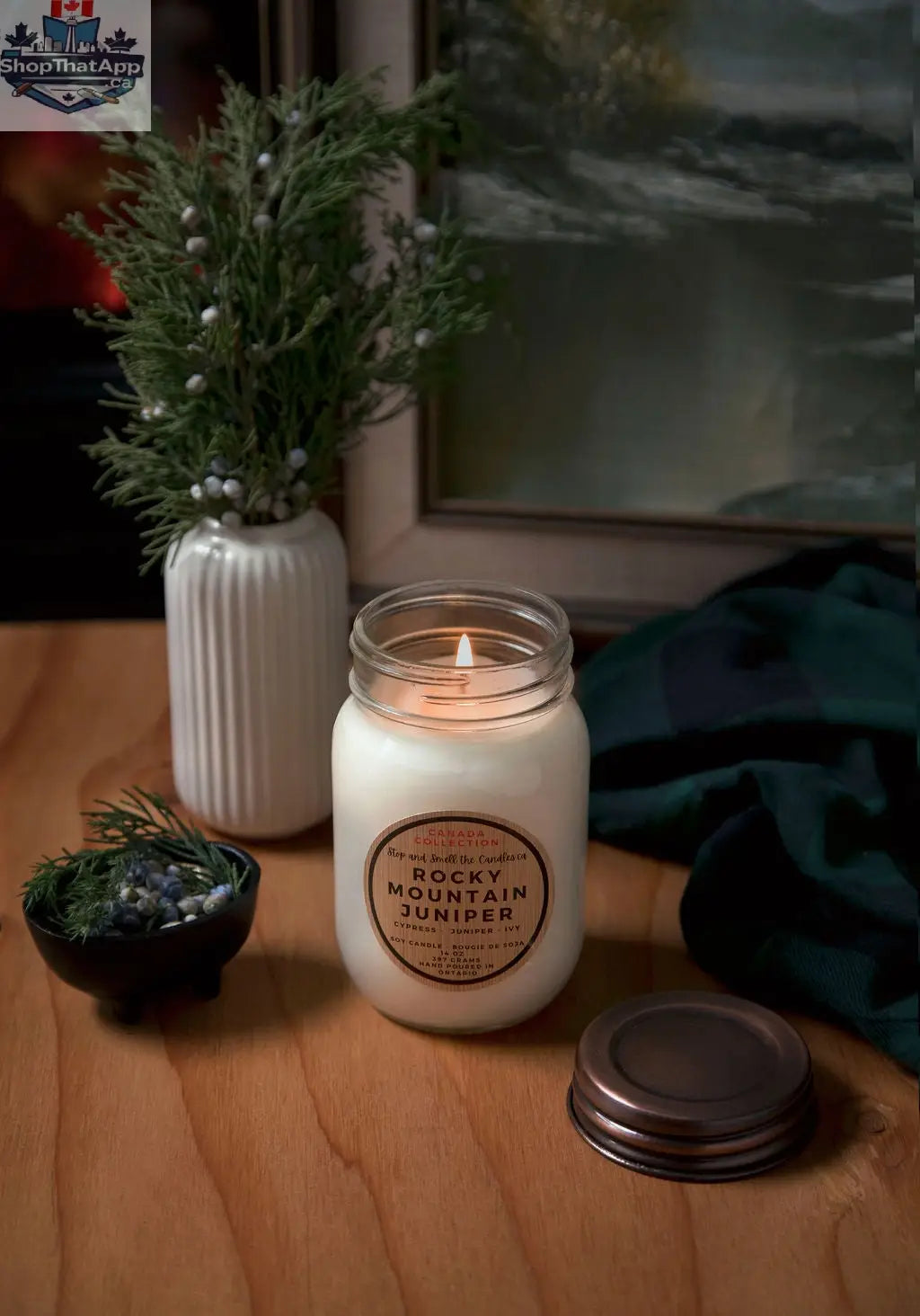 Stopandsmellthecandles Rocky Mountain Juniper soy candle with a cotton wick, showcasing a 14oz jar and a fresh, woodsy aroma.