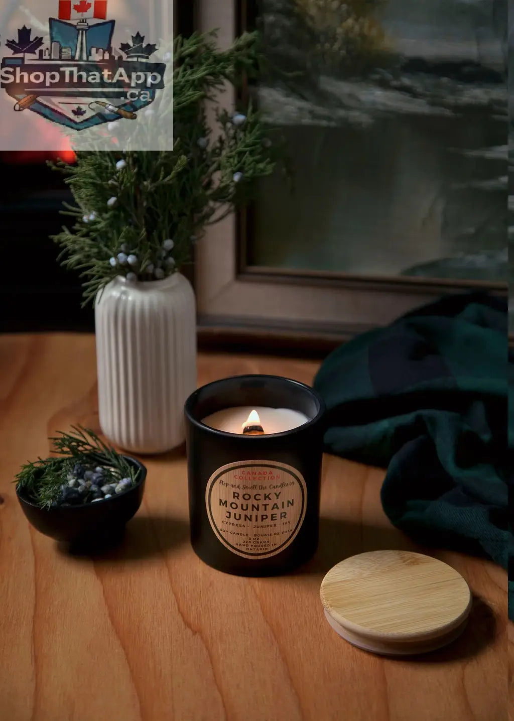 Stopandsmellthecandles Rocky Mountain Juniper 8oz soy candle with wood wick, perfect for creating a cozy atmosphere.