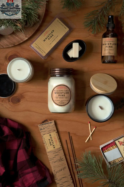 8 oz Whistler Pine soy candle from Stopandsmellthecandles with a white container and a pine forest-themed label.