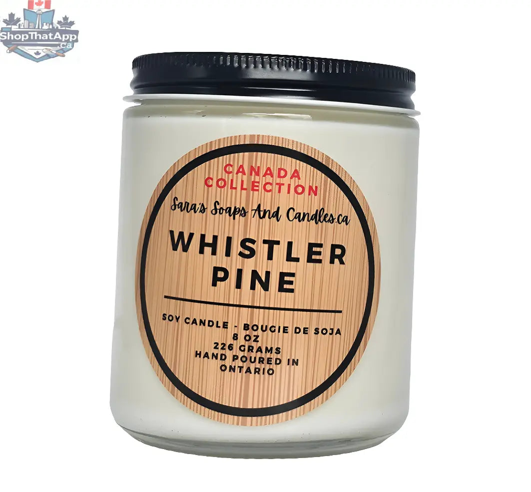 Stopandsmellthecandles Whistler Pine Soy Candle, 8 oz, featuring a cozy pine scent in a glass jar with a wooden lid.