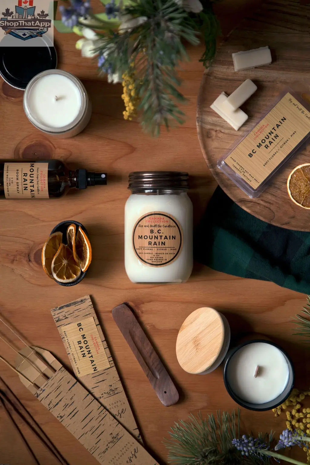 8oz BC Mountain Rain soy candle by Stopandsmellthecandles with a natural aroma, shown in a flat lay with candle and packaging.