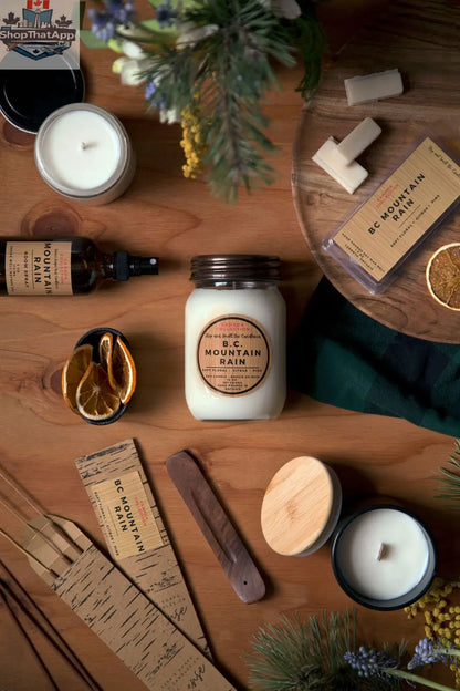 8oz BC Mountain Rain soy candle by Stopandsmellthecandles with a natural aroma, shown in a flat lay with candle and packaging.