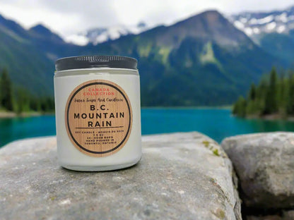 Stopandsmellthecandles BC Mountain Rain soy candle in 8oz jar with a fresh, natural aroma and mountain-inspired design.