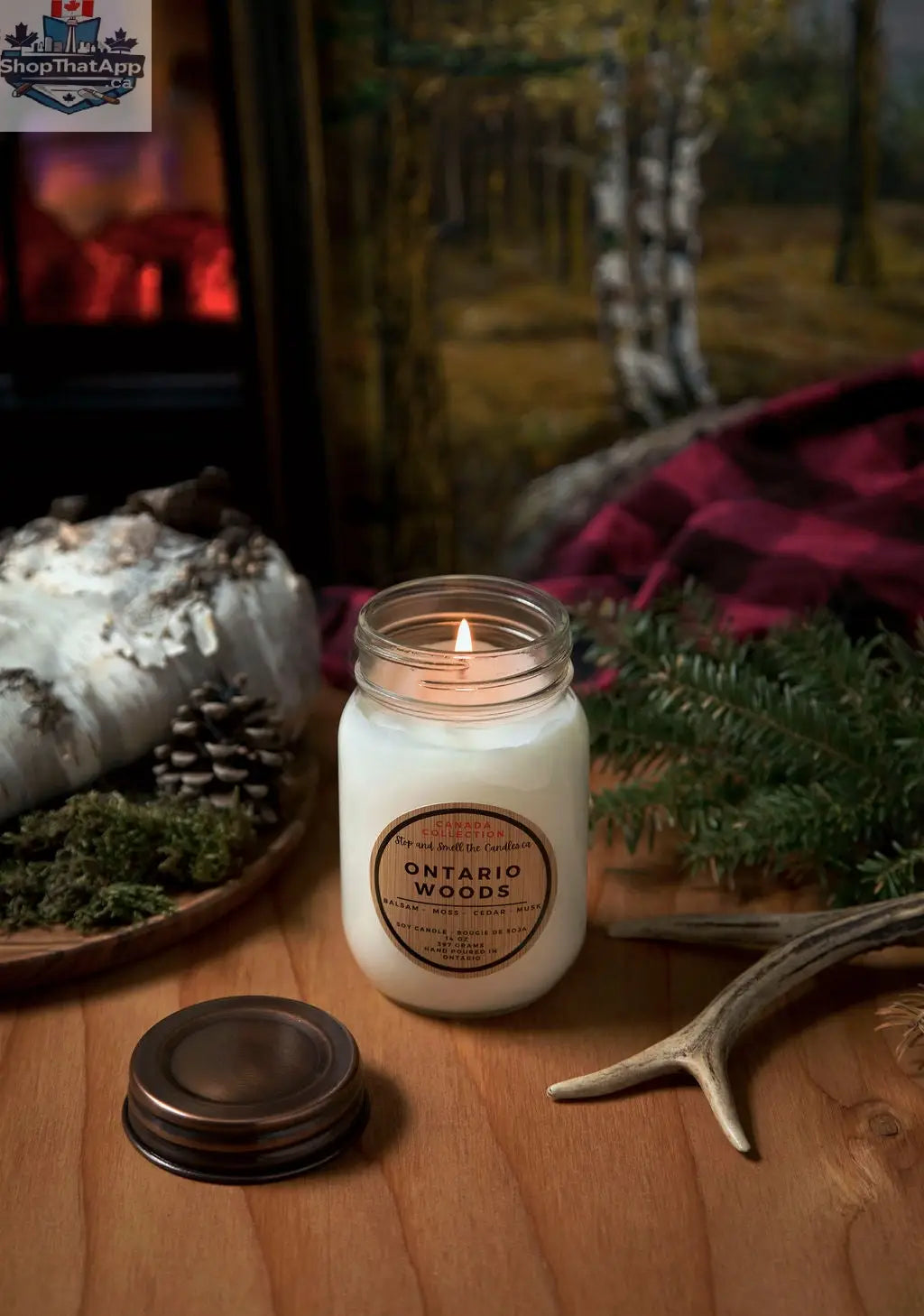 Ontario Woods soy candle with cotton wick in a 14oz jar, showcasing warm woodsy scent and natural wax finish.