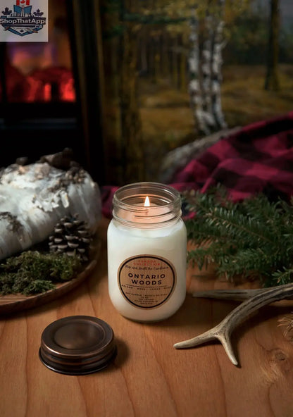 Ontario Woods soy candle with cotton wick in a 14oz jar, showcasing warm woodsy scent and natural wax finish.