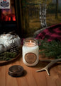 Ontario Woods soy candle with cotton wick in a 14oz jar, showcasing warm woodsy scent and natural wax finish.