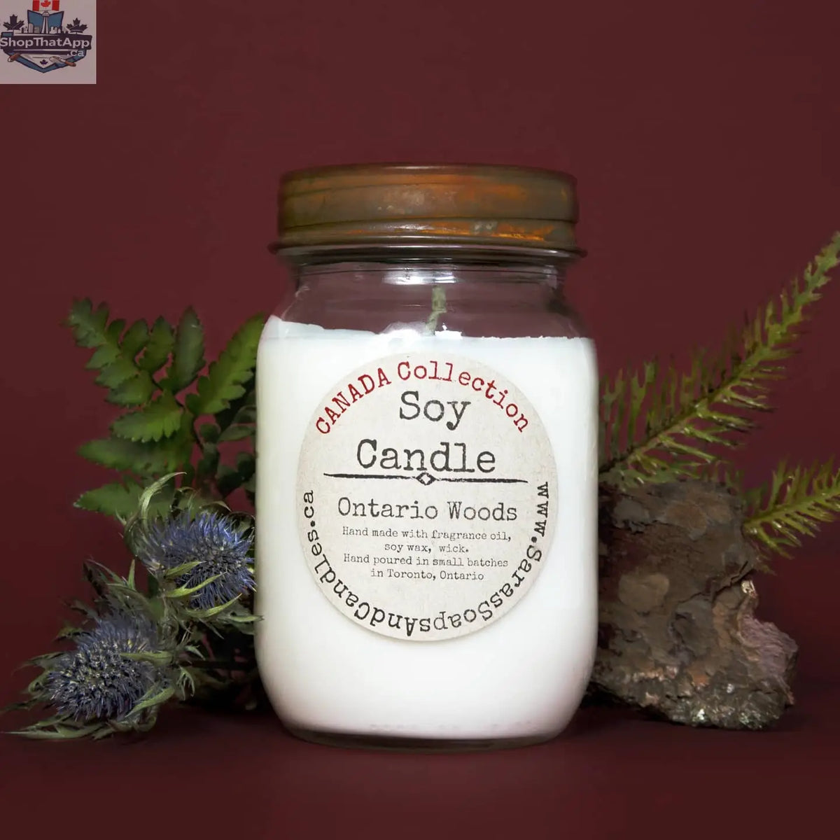 Large Ontario Woods soy candle by Stopandsmellthecandles in a 14oz glass jar, featuring a rustic wood-inspired label and natural wax.