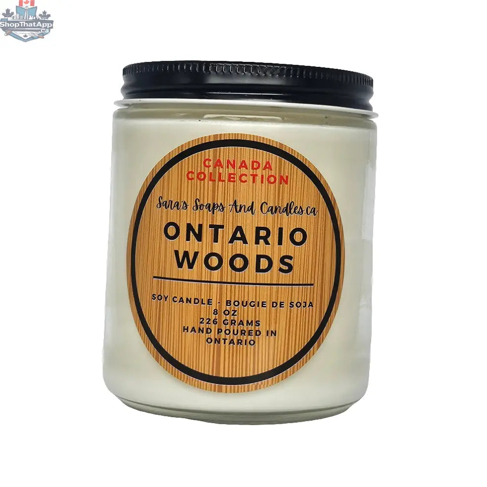 Stopandsmellthecandles Ontario Woods soy candle in an 8 oz container, with a rustic label and warm wooden accents.