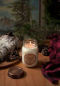 14oz Whistler Pine soy candle by Stopandsmellthecandles with a cotton wick, featuring a rustic pine scent in a clear glass jar