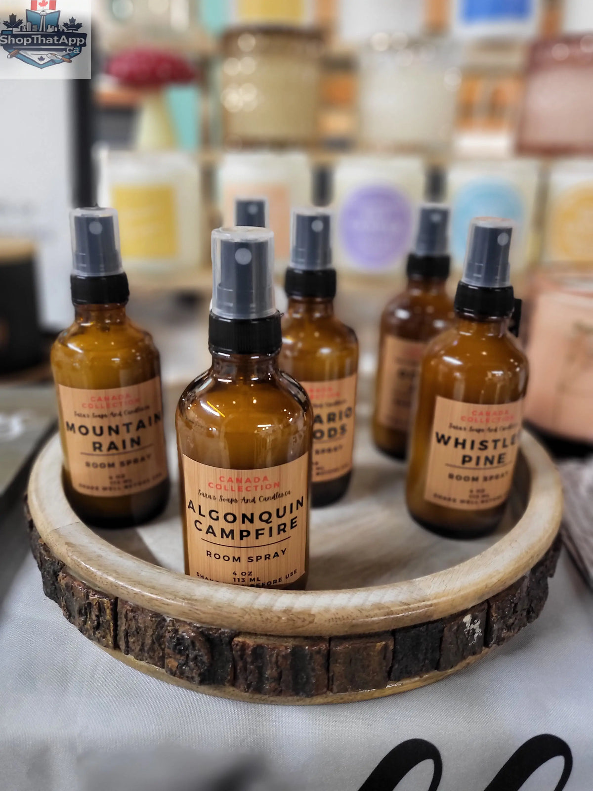 Stopandsmellthecandles room spray bottle with a sleek design, ready to freshen any space with a subtle, inviting scent.
