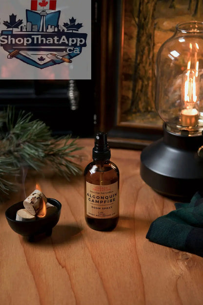 Algonquin Campfire room spray by Stopandsmellthecandles, featuring a spray bottle with a campfire scent for home fragrance.
