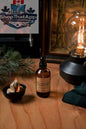 Algonquin Campfire room spray by Stopandsmellthecandles, featuring a spray bottle with a campfire scent for home fragrance.