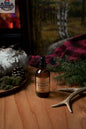 Stopandsmellthecandles Ontario Woods room spray in a sleek bottle, ideal for freshening indoor spaces with natural wood scent.