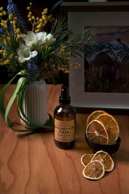 Stopandsmellthecandles Mountain Rain Room Spray, a fresh and aromatic bottle for home fragrance, with a mountain-inspired scent.