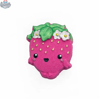 Strawberry face mask by The Bomb Bar Canada for radiant and refreshing skin, shown in a jar with fresh strawberries.