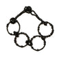 Beaded hoop bracelet by Suzie Blue Canada with colorful beads and silver accents on a white background.