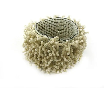Stretchy beaded urchin bracelet by Suzie Blue Canada featuring colorful beads and a versatile, stylish design.