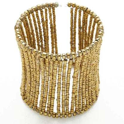 Beaded column bracelet by Suzie Blue Canada featuring colorful beads and a sleek cuff design.