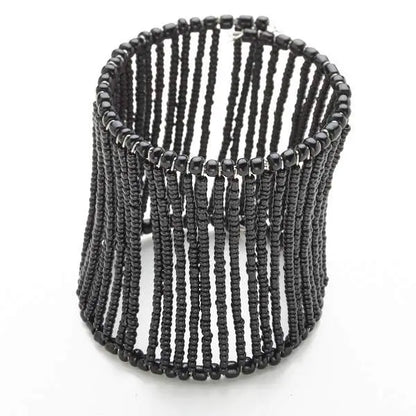 Beaded column cuff bracelet by Suzie Blue Canada featuring colorful beaded design on a sleek bracelet.
