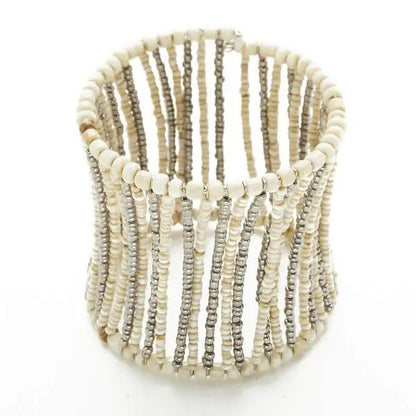 Beaded column cuff bracelet by Suzie Blue Canada featuring colorful beads and a stylish, handcrafted design.