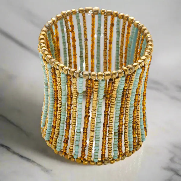 Beaded column cuff bracelet by Suzie Blue Canada featuring colorful beads and a stylish, handcrafted design.