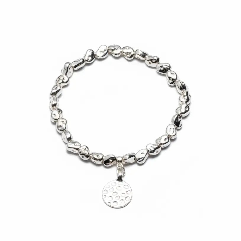 Silver plated Beaten Circle Charm Nugget bracelet by Suzie Blue Canada featuring textured circular charms and a sleek silver finish.